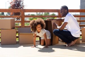 Happy dad and daughter at new location